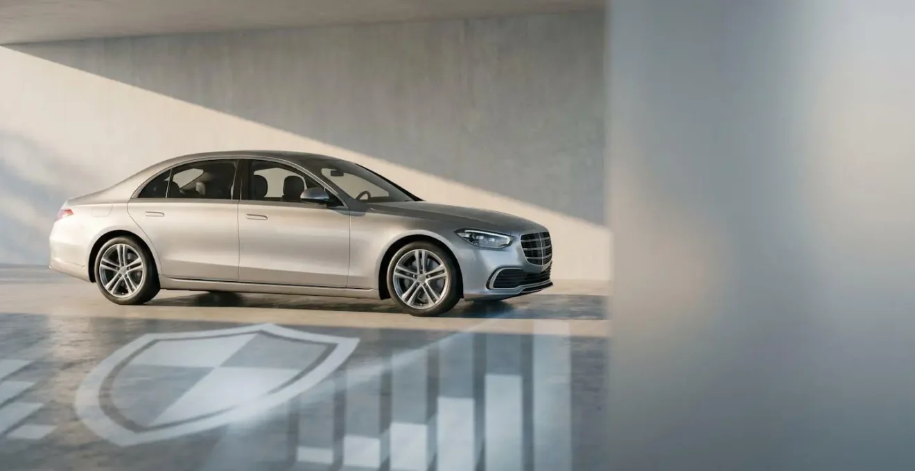 Pristine new vehicle in showroom with selective focus highlighting financial protection concepts