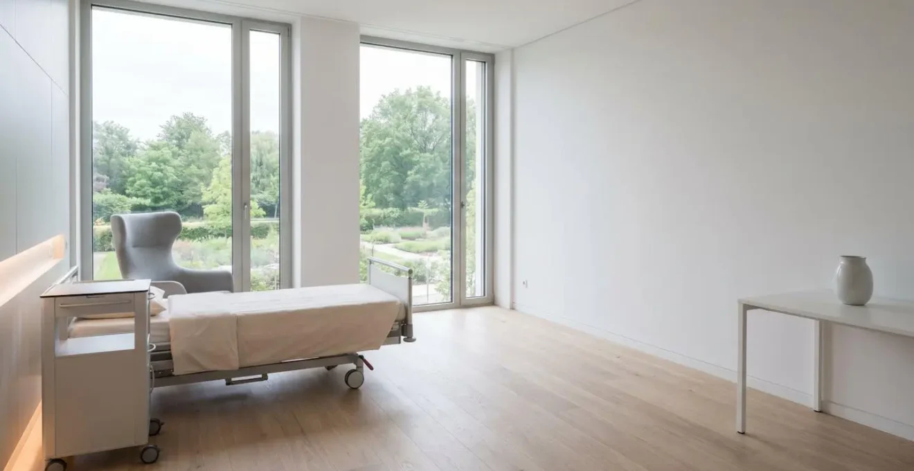 Modern private hospital room with natural light emphasizing patient privacy and comfort